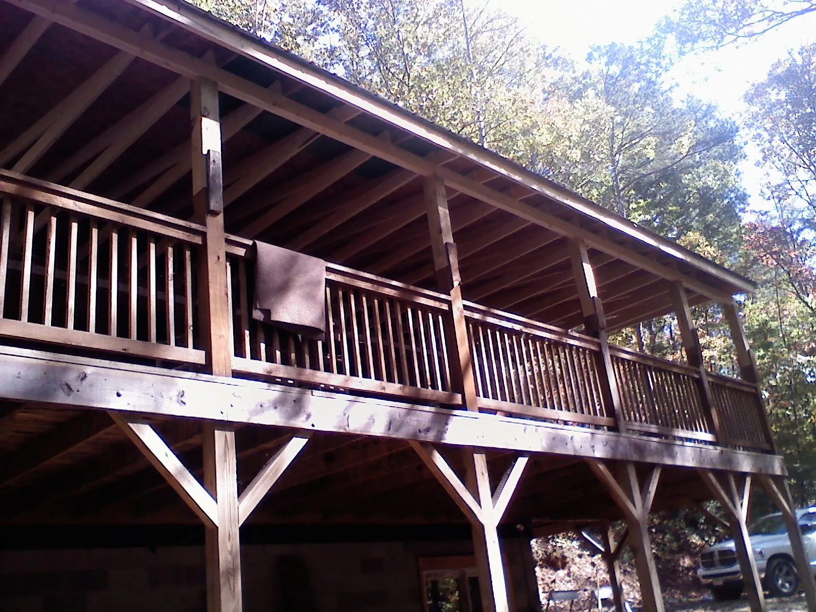 Timber framing under a new elevated porch and deck — Roof Leak Repair in Mc Callsburg by Roofing Brothers
